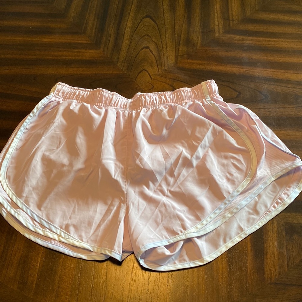 Light pink Nike shorts